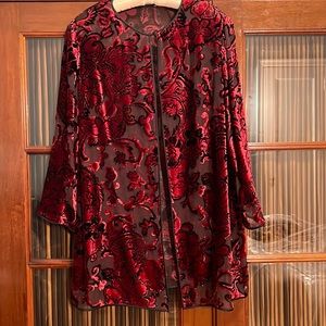 Cape with red velvet flowers